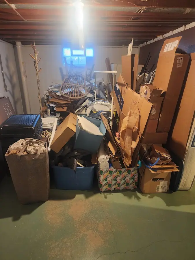 Roll-off dumpster container at job site for 20 Yard Dumpster Rental in Friendly